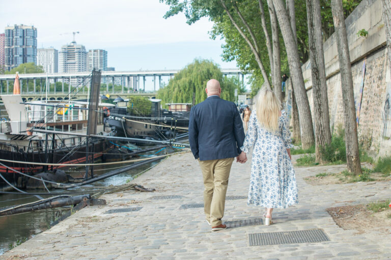 Katie and Dan walking by the Seine