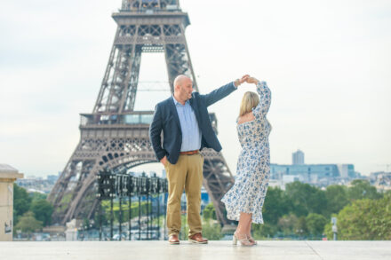 Katie and Dan dancing in front of the Eiffel Tower